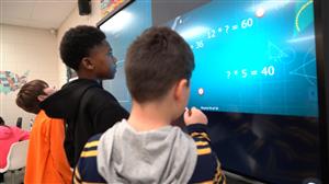 boy at touch screen 